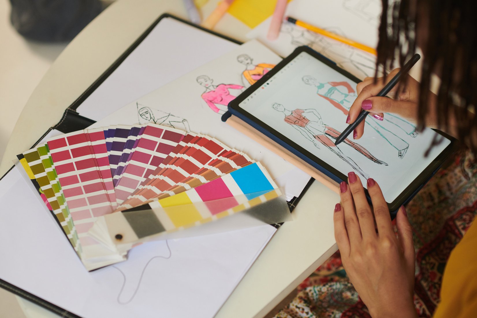 Female Designer Drawing Fashion Illustration